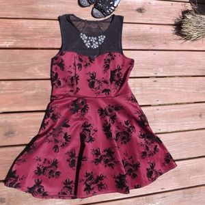 Burgundy and black fit and flare dress